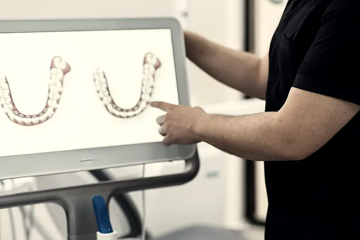 A clinician reviewing an ELVYTA digital setup